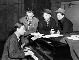 Bing With Hoagy Carmichael (piano), director Wesley Ruggles, and young Donald O' Connor (far right)
